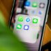 Photo of iPhone with social apps displayed